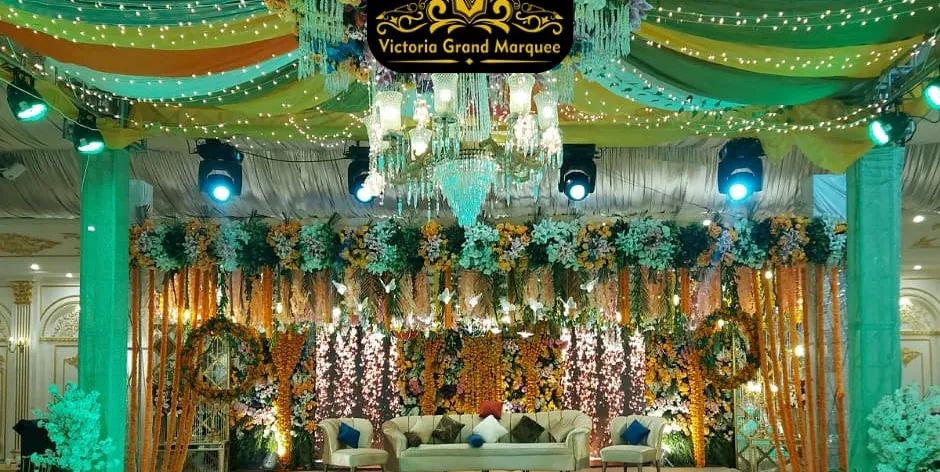 Green canopy walkway styled for a Mehndi evening